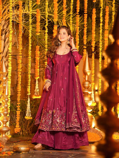 Designer Anarkali dress showing 4 meter flare and heavy embroidery border detail