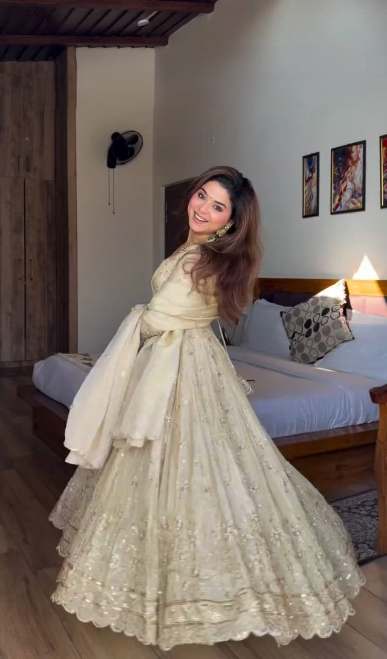 cream anarkali gown Cream embroidered Anarkali gown for women in Chinon silk
Elegant cream Anarkali gown with sequins embroidery work
Designer cream ethnic gown with full sleeves for wedding
