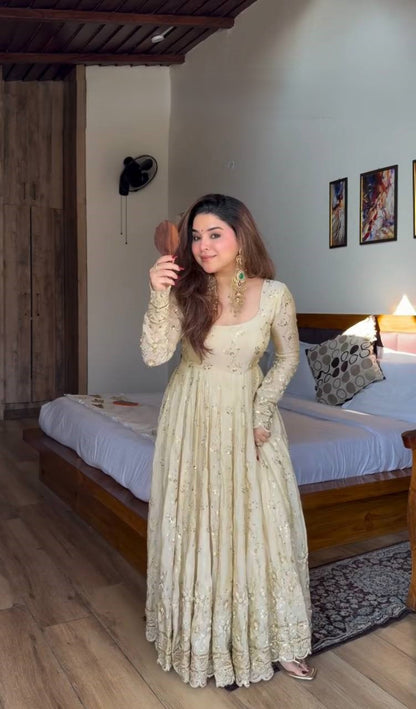 Stylish cream embroidered gown with flowy silhouette
Premium party wear Anarkali gown in cream color
Cream Anarkali outfit for wedding guest look